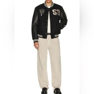 53 Premium Varsity Jacket in Black
Playboy